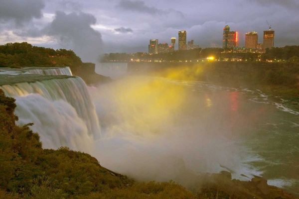 NY, Niagara Falls at dusk with colored lights